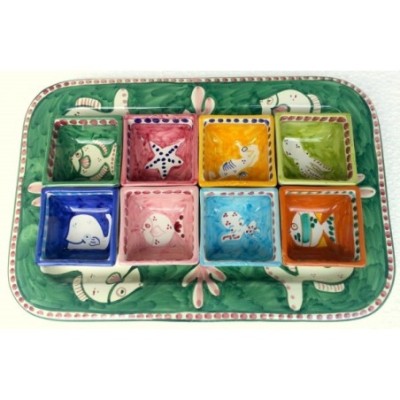Ceramic tray with square bowls.