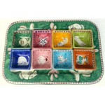 Ceramic tray with square bowls.