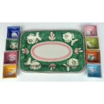 Ceramic tray with square bowls.